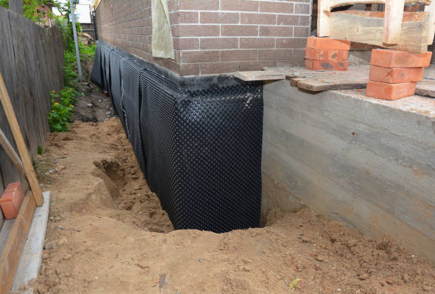 SJ Waterproofing Pros technician performing targeted Exterior Waterproofing assessment in Montezuma, GA